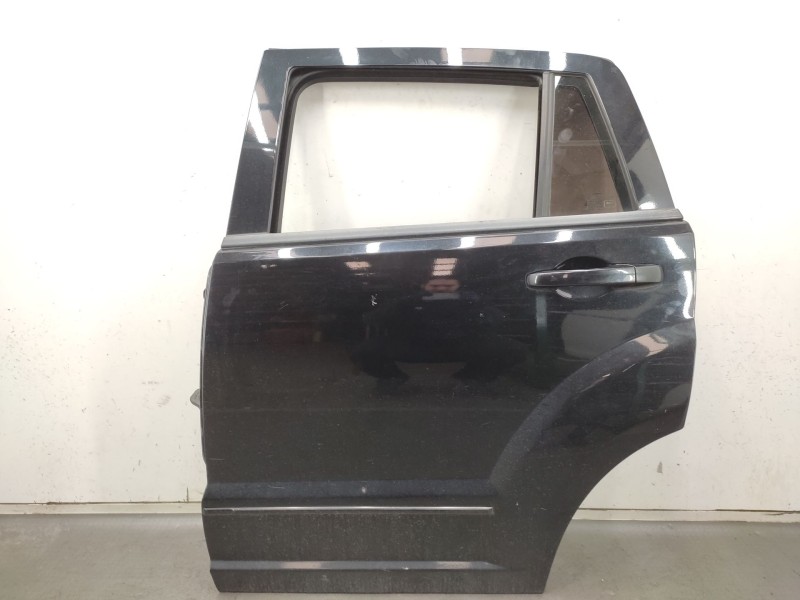 Recambio de puerta trasera izquierda para dodge caliber 2.0 crd referencia OEM IAM   