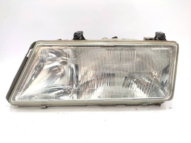 Recambio de faro izquierdo para lancia dedra berl. 1.8 i.e. le referencia OEM IAM   