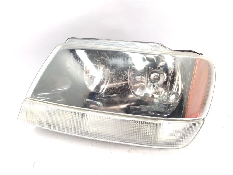Recambio de faro izquierdo para jeep gr.cherokee (wj/wg) 4.0 laredo referencia OEM IAM   